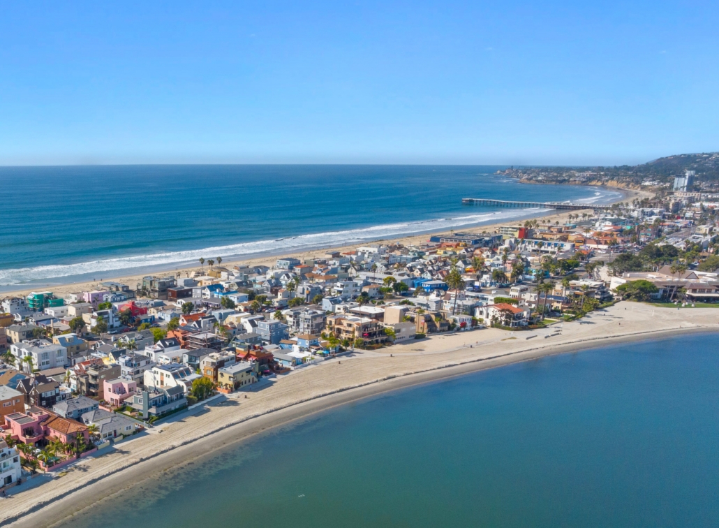 Aerial view of Mission Beach between ocean and Mission Bay